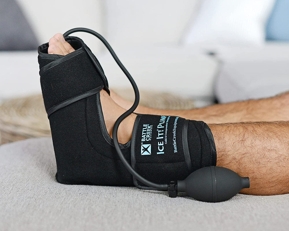 a picture of foot with a battle creek ice it pump with air hose and hand pump