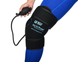 Photo of a knee wearing a battle creek ice it pump with air hose and hand pump 
